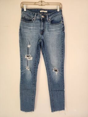 Levi's 711 Distressed Frayed Skinny Jeans